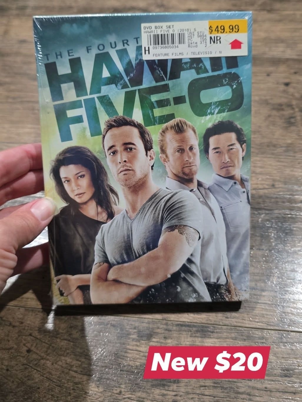 Source Unknown Hawaii Five-0 DVD Set with Blue-Green Cover